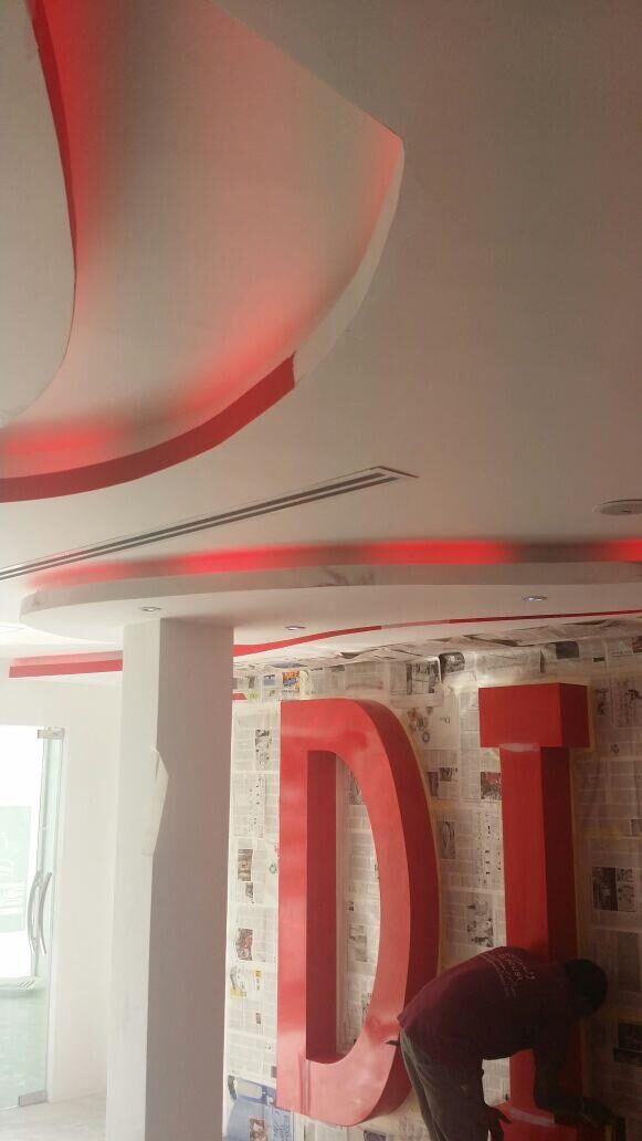 Branded feature wall and ceiling detail