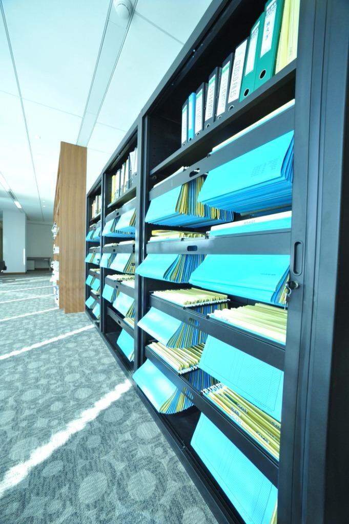Retail display wall with feature lighting