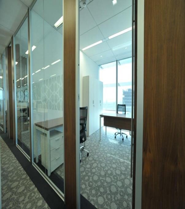 Glass partition offices with lighting design